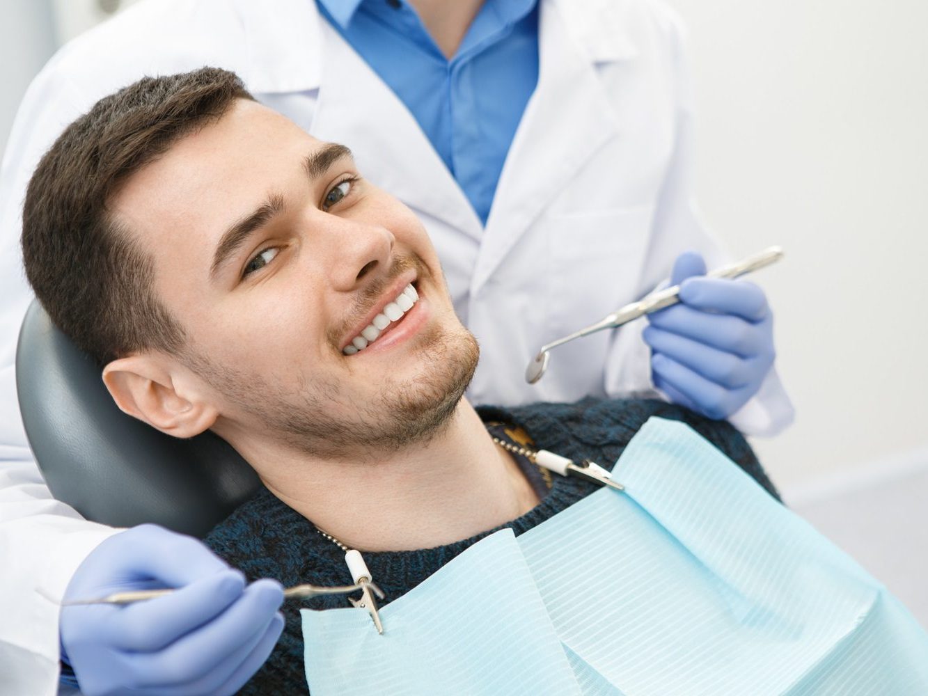 A patient smiling after treatment