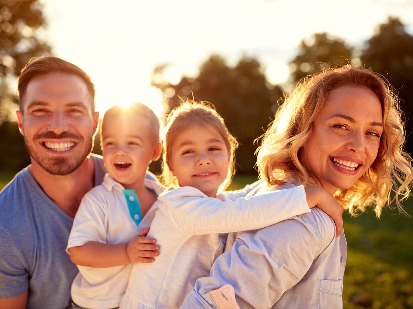Parents and their children enjoying time together outside