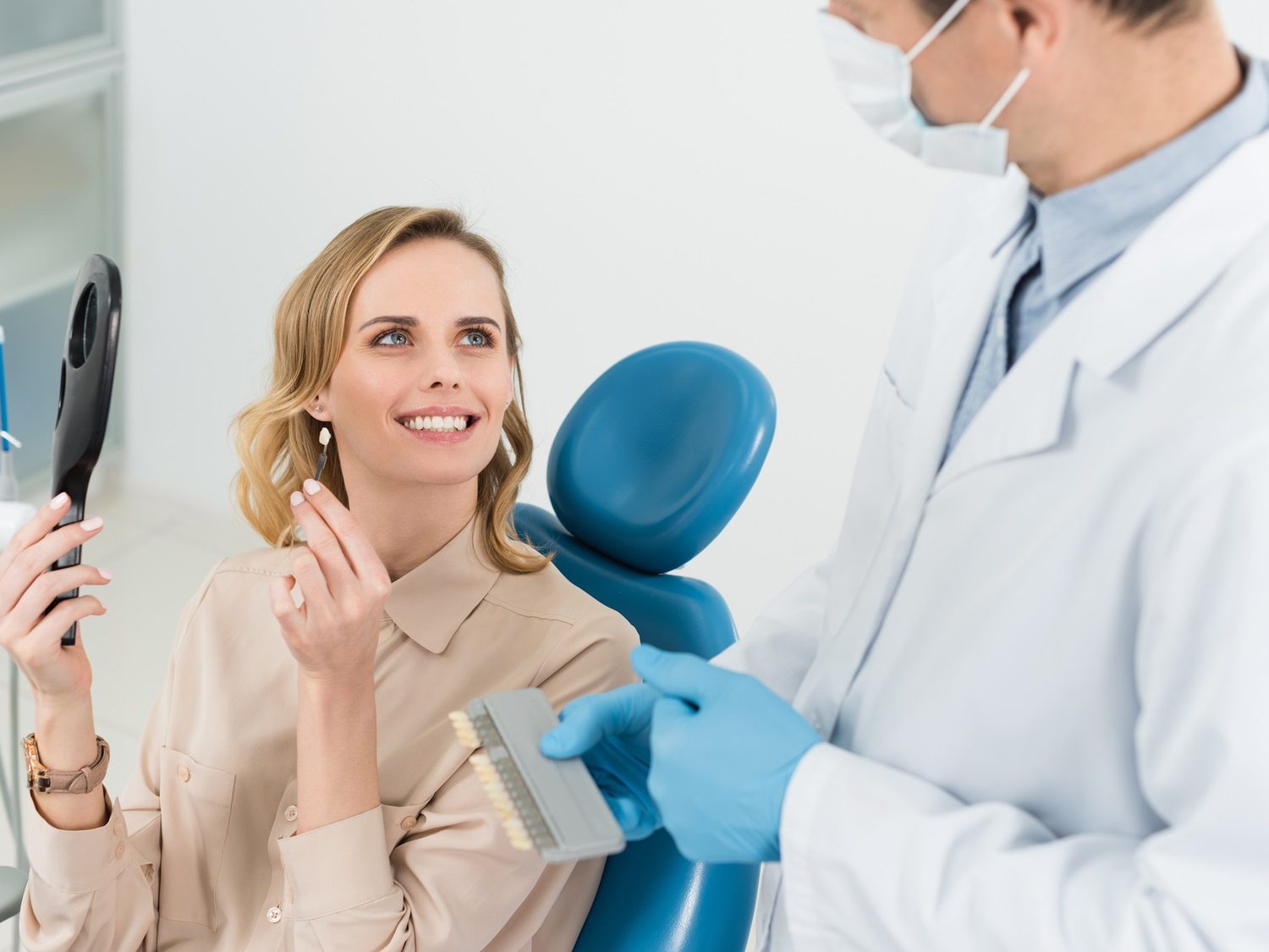 A patient discussing veneer options with a dentist