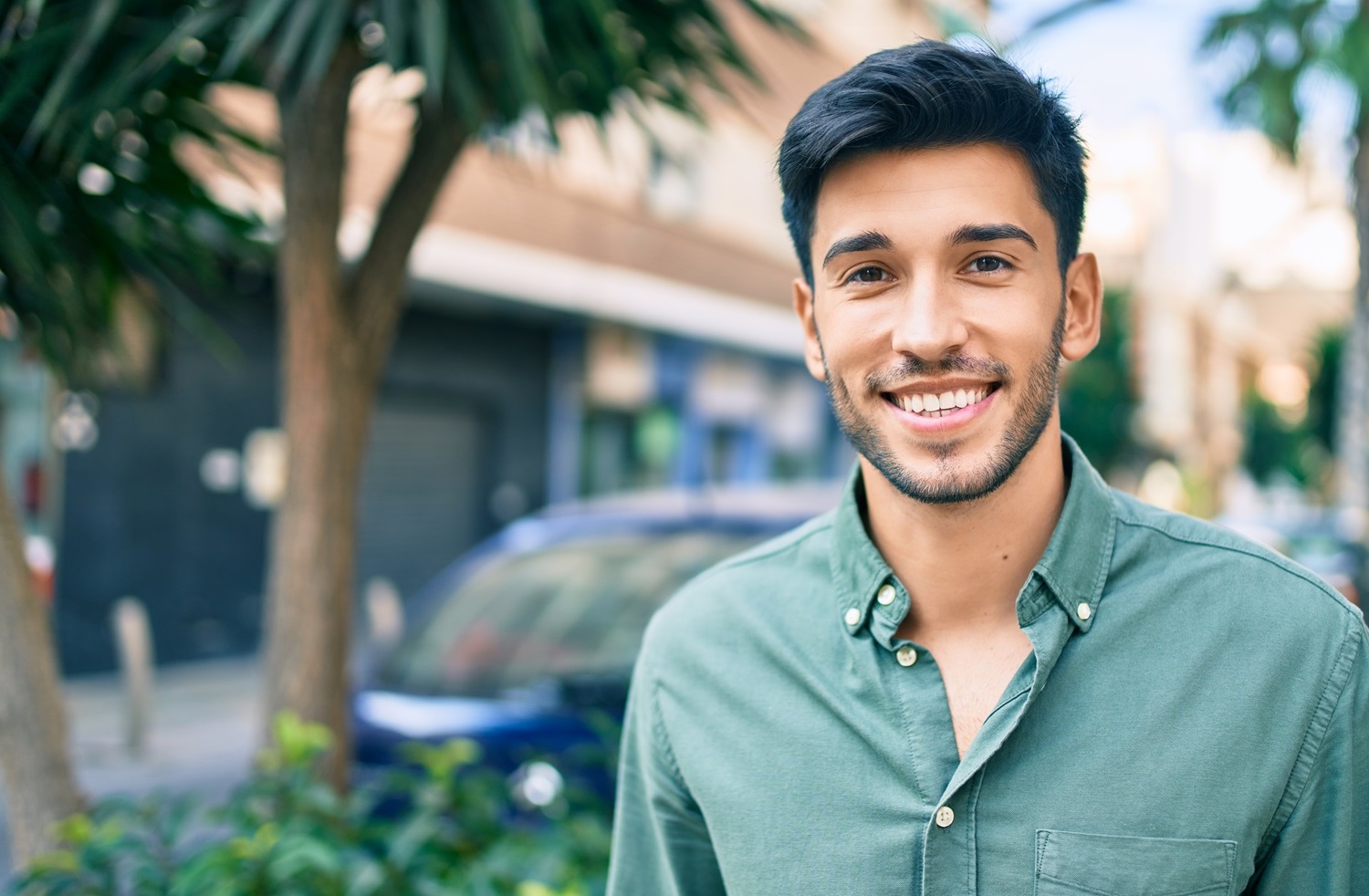 Man outdoors smiling - Dental Crowns in Rancho Bernardo
